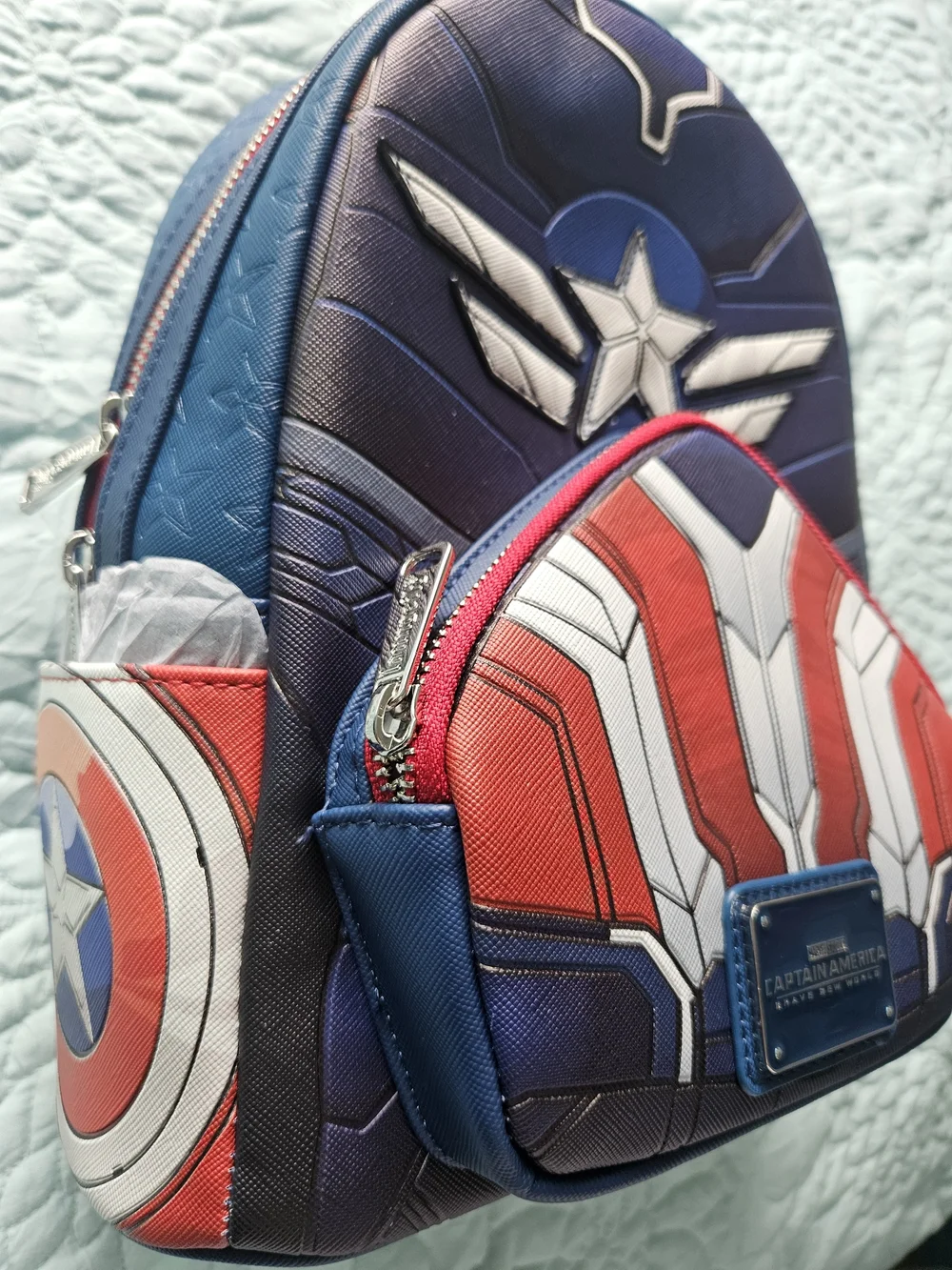This is a Loungefly Marvel Captain America: Brave New World Cosplay Mini Backpac